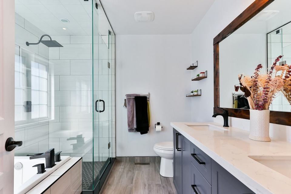 Finished bathroom with glass shower enclosure