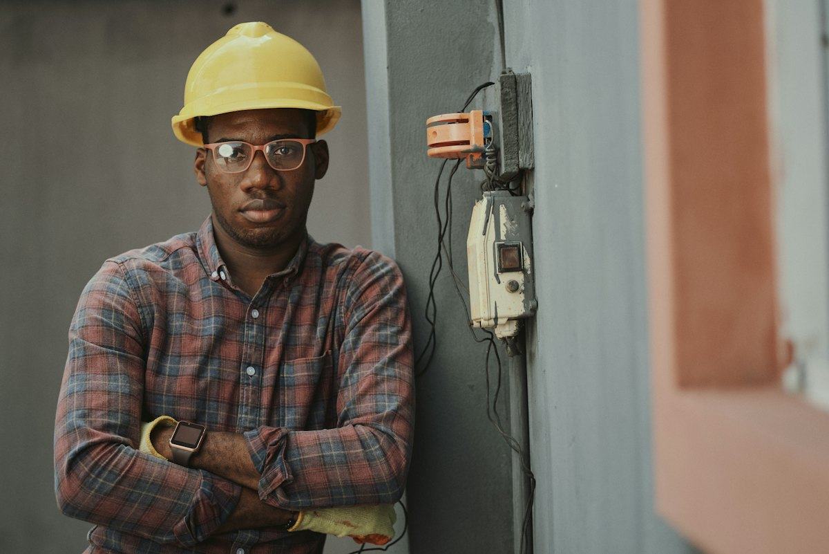 Technician servicing building mechanical equipment